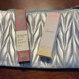 Silver Quilted Cosmetic Bag with Beauty Products